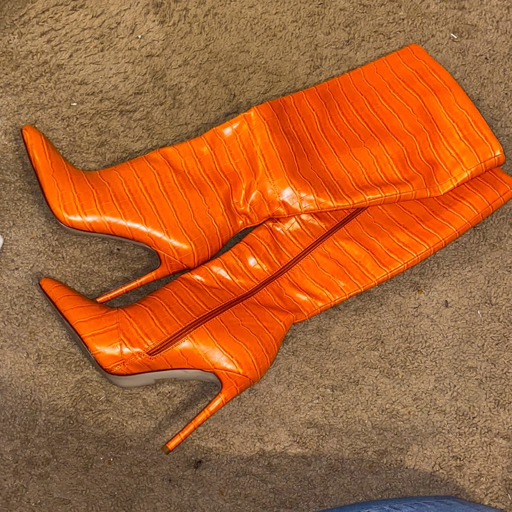 Orange Knee high heeled boots